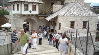 Old bridge  Stari most in Mostar with muezzin [upl. by Silohcin]