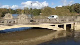 The flooded River Severn from the old bridge at Atcham Shrewsbury Shropshire [upl. by Kendrah]