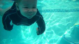 Talented baby jumps in and swims across pool [upl. by Greenwood]