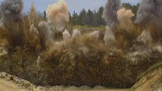 Blasting Crew Loading Explosives And Blowing Up Solid Rock At A Quarry from House Construction Ahead [upl. by Maller438]