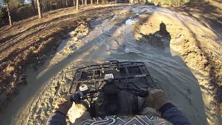 Arctic Cat 400 4x4 TBX in the mud [upl. by Caravette]