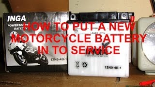 How to put a new motorcycle battery in service [upl. by Annawad830]