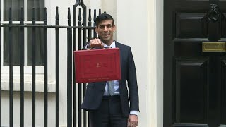 British Chancellor Rishi Sunak presents the budget red box  AFP [upl. by Aneetsirhc]