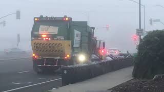 Manual Side Loading Garbage Truck Picking Up A Long Line Of Garbage Cans [upl. by Cosme]