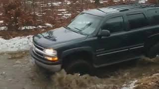 Lifted Tahoe on 35s vs mud hole [upl. by Atul629]