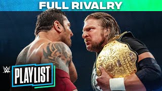 Batista vs Triple H – RIVALRY HISTORY WWE Playlist [upl. by Gnivri]