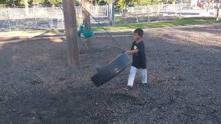 Tire swing fun at the park [upl. by Eidak]