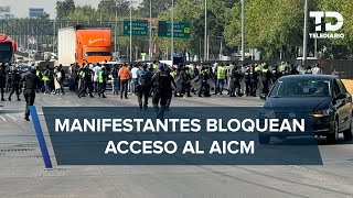 En AICM ex miembros de Interjet protestan por falta de pagos y se enfrentan con policías [upl. by Tarr539]