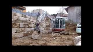 Takeuchi TB135 mit KorteGreifer JuraQuader setzen [upl. by Walliw]