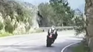 Motorcycle flips over cliff in scary crash caught on tape [upl. by Burne]