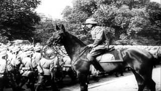 German troops decorated and troops pass in review along Avenue Foch Paris durinHD Stock Footage [upl. by Eblehs]