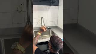 Cup rinser installation on stainless steel kitchen sink [upl. by Yrrap]