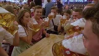 O zapft is Munichs worldfamous Oktoberfest beer festival opens [upl. by Ariamoy220]