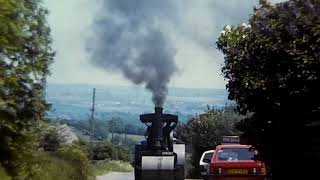 Aveling Barford steam roller number 605 quotKimquot steaming through Beeley Derbyshire early 1980s [upl. by Dloniger9]