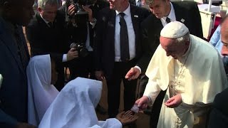 Pope visits mosque in flashpoint Bangui neighbourhood [upl. by Gettings]