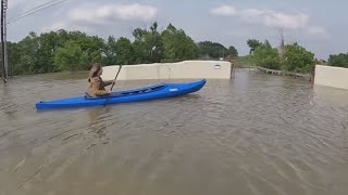 Homeowner using kayak to get in and out of North Texas neighborhood after flooding [upl. by Eilhsa833]