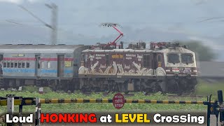 Loud HONKING at LEVEL Crossing  Level CROSSING Trains 2 at Full Speed  Indian Railways [upl. by Adiaj]