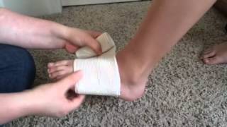 Applying a Figure 8 Elastic Bandage to an Ankle [upl. by Allsopp443]