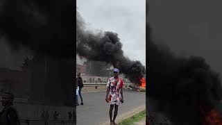 removing FRELIMO flag in protest Maputo Mozambique [upl. by Maurizio]