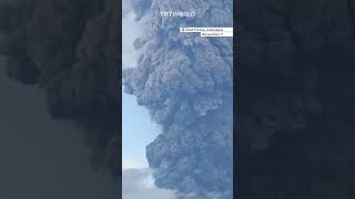 Massive volcanic eruption in Indonesia sends ash tower five miles high [upl. by Artemus]