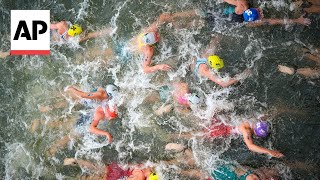 Triathlon kicks off on Day 5 at Paris Olympics  AP Top Photos [upl. by Anek]