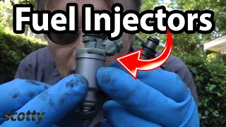 How to Replace Fuel Injectors in Your Car [upl. by Inilahs]