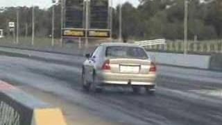 Mitsubishi Magna with no pipes Drag Racing  Heathcote Park Raceway [upl. by Yrailih]