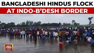 Bangladeshi Hindus Flock At IndoBangladesh Border BSF Troops Deployed To Control Crowd At Border [upl. by Kcaj]