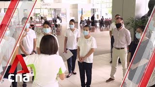 30 Singapore Airlines cabin crew redeployed as care ambassadors at Khoo Teck Puat Hospital [upl. by Hoisch]