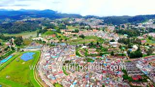 Ooty hill station in Tamil Nadu looks very crowded has many colourful houses in this aerial view [upl. by Ailsa]