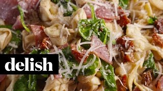 How To Make Tuscan Tortellini Salad  Delish [upl. by Brownley]