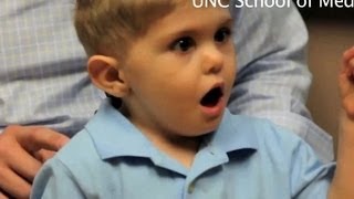 Toddler with cochlear implant says first words [upl. by Yelsnya270]