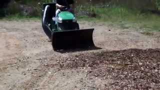 Deere Lawn Tractor using Nordic Auto Plow Riding Mower Blade [upl. by Oilasor]