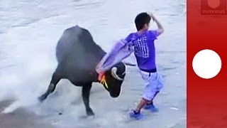 Bullfight gone wrong Bull escapes makeshift arena in Peru attacks people [upl. by Collbaith]