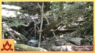 Primitive Technology Water powered hammer Monjolo [upl. by Aicilas]