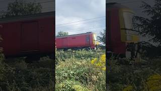 A pair of class 325s and 390112 passing Weddington August 2024 [upl. by Dorrehs]