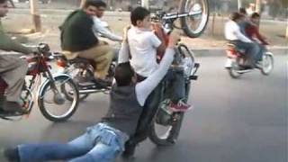 pakistan gorgeous one wheeling by hassan wheeler pakistani stunt wheeli [upl. by Lucian286]