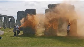 Just Stop Oil Activists spray Stonehenge orange demanding stop of Fossil Fuels [upl. by Inkster]