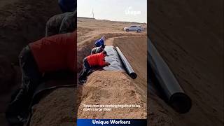 Plastic sheeting being laid down desert  The workers do their job perfectly  machine shorts [upl. by Cronin]