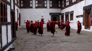 Dancing buddhist monks in Trongsa Dzong Bhutan [upl. by Cherie812]