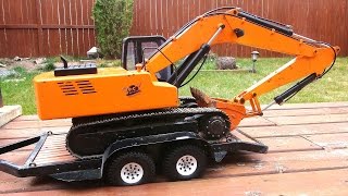 RC ADVENTURES  Flat Tire Overloaded Trailer amp Log Bridge  Earth Digger 4200 XL Excavator [upl. by Cathee98]