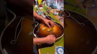 Restringing an 88 year old guitar dangelico [upl. by Bartholomeo519]