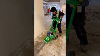 Removing Carpet with a floor scraper deconstruction construction demolition building tools [upl. by Nobel661]