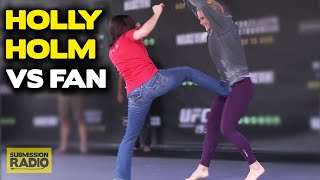 UFC 193 Holly Holm lets fan kick her during open workout [upl. by Rengia]