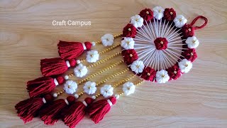 Super Easy Woolen Flower Wall Hanging Craft  Woolen Thread Craft Ideas  Woolen Wall Hanging Design [upl. by Carlynn129]