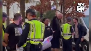 Sen John Fetterman triggers antiIsrael protesters with flag wave [upl. by Anirtal]