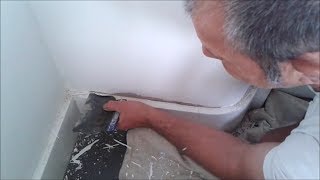 Painting Stucco amp Repairing Cracks With Caulking amp Elastomeric Paint [upl. by Ispep529]