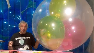 Stuffing Multicolored Crystal 16quot Balloons in a 36quot Clear Balloon [upl. by Ahsilac]