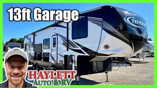 Sold 2018 Torque 371 with 13ft Garage Used Fifth Wheel Toy Hauler by Heartland RV [upl. by Perrins]