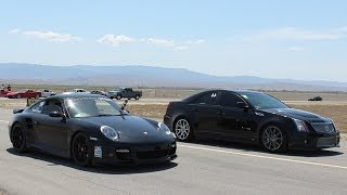 Porsche 911 Turbo vs Cadillac CTSV [upl. by Honig]